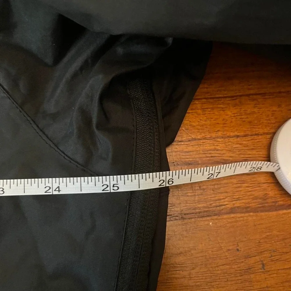 Black and grey waterproof jacket with removable hood